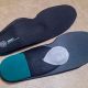 A pair of custom insoles